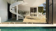 Former triathlete Ingi Doyle lists luxury lakeside home