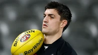 Collingwood suffer brutal blow as spiritual leader heads for surgery