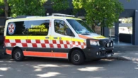 Young woman critical after car smashes into bus shelter