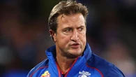 Luke Beveridge inks new deal as ‘weird’ move questioned