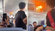 Frantic scenes as fire breaks out in plane cabin and forces emergency landing