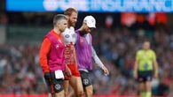 Umpires cop it again as background audio picks up discussion