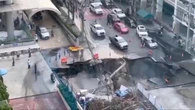 Dramatic moment Bangkok sinkhole swallows truck