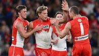 Swans grind out ‘really tough’ win over impressive Roos