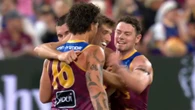 Brisbane coach denies hint after players’ subtle half-time act