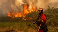 Thousands flee as deadly fires rage in southern Europe