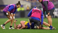 AFL young gun in serious pain after scary incident