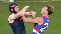 AFLBulldogs down Dees to go top of AFL ladder