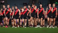Premiership coach among 10 candidates on Essendon’s radar