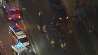 Peak-hour chaos as man trapped after rollover crash on busy highway