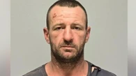 Grim update as body found in hunt for triple murderer