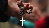 Archbishop asks Vatican to defrock priest charged with brutal murder