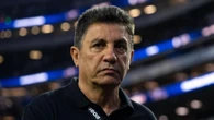 Coach says team was booted out of USA hours after World Cup game