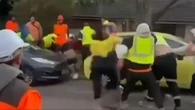 Blur of high-vis as tradies come to blows at work site