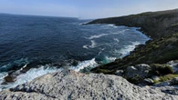 Tragedy at picturesque bay as surfer dies after being pulled from water