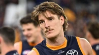Crows coach sets record straight after star’s car hits pedestrian