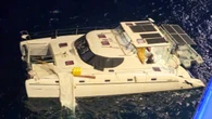 Aussie couple’s fear in wild swell before rescue by ‘floating city’