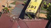 One injured as bus full of passengers crashes into house in Sydney