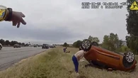Video shows dramatic rescue of baby pinned by car in US