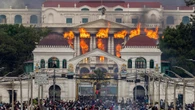 Nepal PM quits as parliament burns
