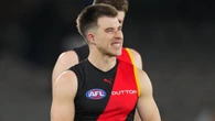 Rival circling as ‘worried’ Essendon urged to cash in on Zach Merrett