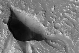 Caves carved by water on Mars may hold signs of past life