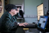 Eye implant and high-tech glasses restore vision lost to age