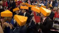 Why were people wearing cheese hats at Trump’s speech?