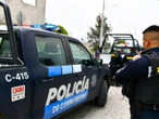 Vandalizan patrulla y 'desviven' a policía en Querétaro