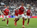 Arsenal remonta y acecha el liderato del Liverpool