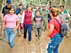 La ayuda fluye tras desastre por lluvias; suman 72 decesos y 48 desaparecidos