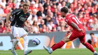 Arsenal reage no segundo tempo e arranca empate com o campeão Liverpool em Anfield