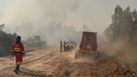 El avance del fuego hacia El Arenal obliga a confinar a sus vecinos por el humo