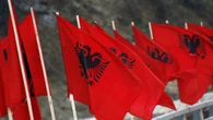 Un juez albanés muere en un tiroteo en un tribunal en medio de una creciente indignación por las reformas del sistema judicial