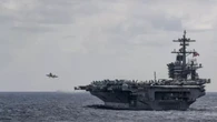 Un helicóptero y un caza que habían desgegado del portaaviones Nimitz se estrellan en el Mar de China con 30 minutos de diferencia