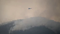 El incendio en la Vall d'Uixò sigue sin control y ha quemado ya 7.500 hectáreas tras no poder volar por la mañana por el humo pero hay "optimismo" de cara a la noche