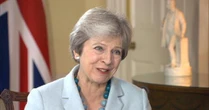 Theresa May says she believes Iran is holding up its end of the nuclear deal