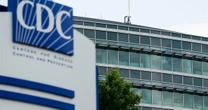 CDC staff reel from shooting, harassment, mass layoffs