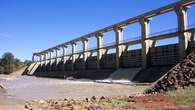 Search for man who failed to resurface in swollen outback Queensland dam