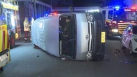Allegedly drunk driver charged after being trapped in flipped van