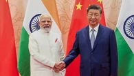 Xi and Modi talk friendship in a 'chaotic' world as Trump's tariffs bite