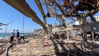 Israeli strike kills 30 at cafe popular for co-working, official says