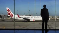 Virgin to cut flights, raise costs after $40 million fuel hit