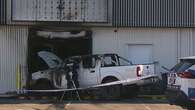 Ute torched after being driven into Queensland tobacco shop