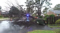 Wild weather knocks out power, cuts trains and threatens homes