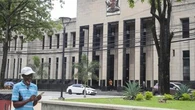 Caribbean nation investigates 56 bodies dumped at a cemetery
