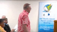 Albanese quickly changes shirt after fashion faux pas at crucial summit