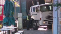 Garbage truck smashes into wedding dress shop