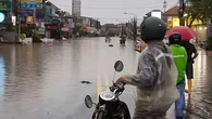 Fifteen killed, roads to airport blocked as deadly floods grip Indonesia