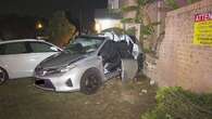 Man injured after two cars slam into brick fence in Sydney's west